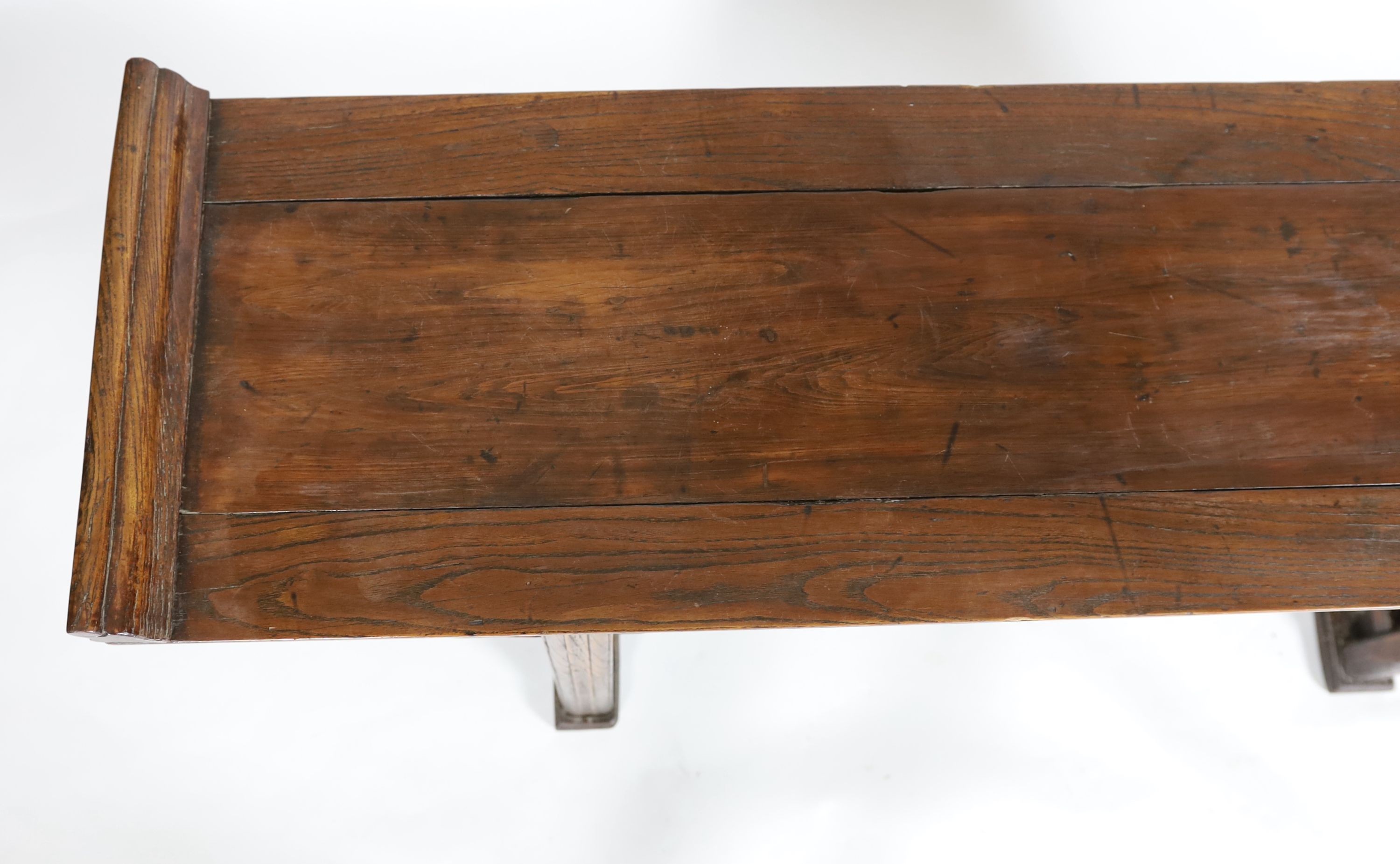 A Chinese elm and cypress wood altar table, 17th/18th Century, 168 cm long, 43 cm deep, 93 cm high, length reduced
